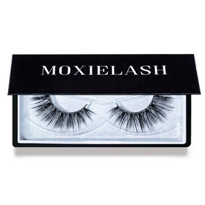 Close-up of a pair of dramatic false eyelashes in a sleek black case labeled MOXIELASH, showcasing the Sexy Lash | Moxielash style for enhanced eye beauty.