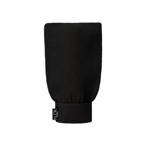 Black exfoliating mitt with elastic wristband and NUDA label, designed for effective skincare and body care exfoliation. Exfoliating Mitt | NUDA.