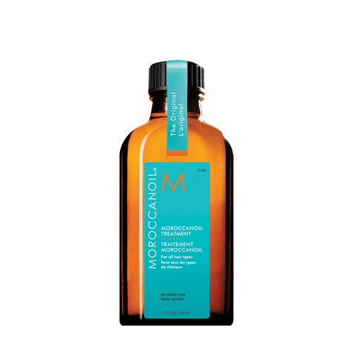 Moroccanoil Treatment | Moroccanoil in an amber bottle with a blue label, designed for hair care and suitable for all hair types.
