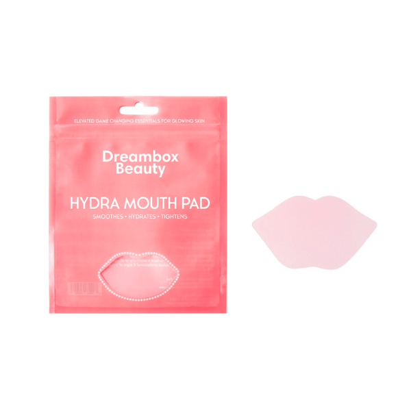 Pink hydrating lip-shaped reusable lip mask with packaging labeled "Dreambox Beauty HYDRA MOUTH PAD" designed to smooth, hydrate, and tighten lips, part of skincare wellness tools from Hydrating Reusable Lip Mask | Dreambox Beauty.