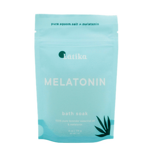 Packaging of Bath Soak | Latika in light blue with melatonin and lavender essential oil, designed for relaxation and wellness skincare routine.
