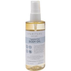 Clear bottle of Fragrance Free Body Oil | Sparitual with a white pump top, designed for gentle skincare and body care with organic sunflower oil and rice bran extract.