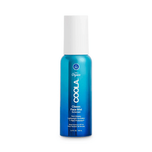 Classic Face Sunscreen Mist SPF 50 | COOLA in a sleek blue bottle with white cap, offering lightweight hydration and broad spectrum SPF protection for skincare.