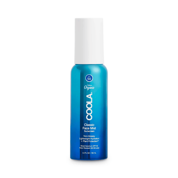 Classic Face Sunscreen Mist SPF 50 | COOLA in a sleek blue bottle with white cap, offering lightweight hydration and broad spectrum SPF protection for skincare.