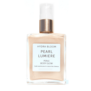 Pearl Body Glow | Hydra Bloom in a clear bottle with a pump dispenser, featuring a shimmering, pearlescent body care oil designed to enhance skin radiance and hydration.