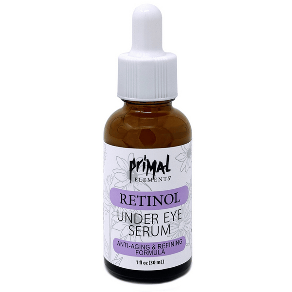 Brown glass dropper bottle labeled Retinol Under Eye Serum with anti-aging and refining formula by Primal Elements, highlighting skincare benefits for under eye care. Retinol Anti-Aging Under Eye Serum | Primal Elements