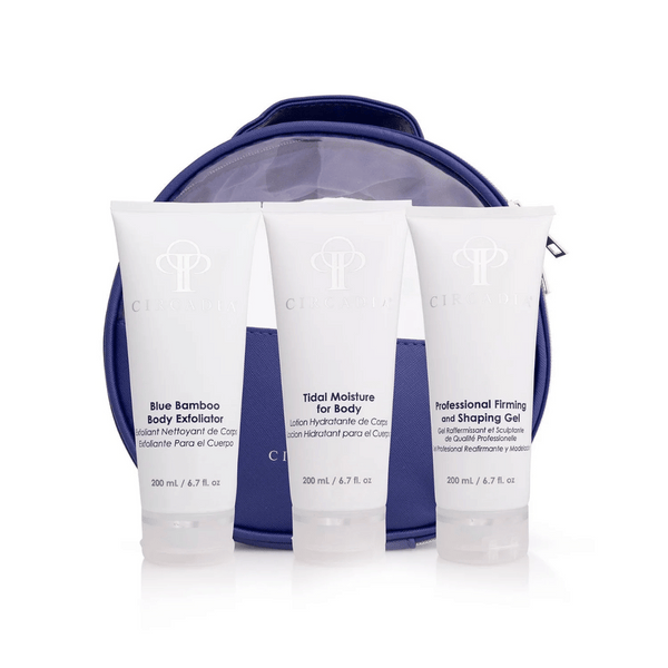 Three white tubes of skincare products labeled Blue Bamboo Body Exfoliator, Tidal Moisture for Body, and Professional Firming and Shaping Gel, displayed in front of a blue cosmetic bag for the Body Regimen Bundle | Circadia.