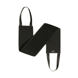 Black fabric tanning mitt with adjustable straps designed for easy application on hard-to-reach areas, featuring the Self Tan Back Applicator | NUDA for smooth, even body care.