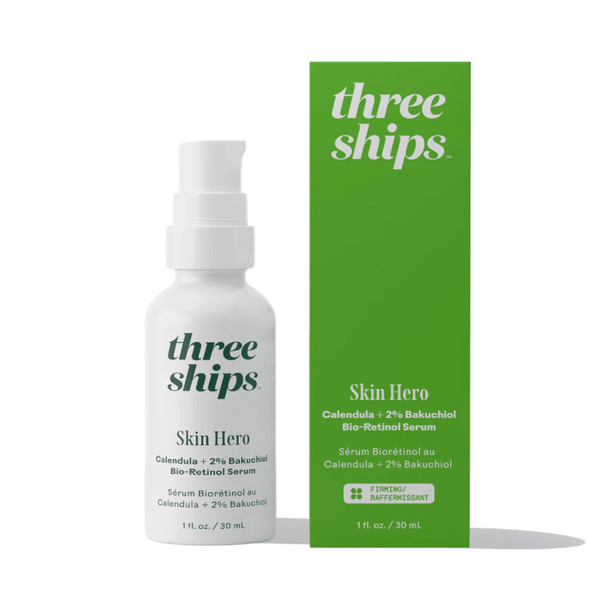 White pump bottle and green box packaging for SkinHero™ Calendula + 2% Bakuchiol Bio-Retinol Serum | Three Ships, a skincare product for firming and skin care.