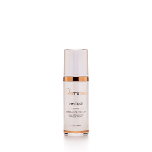 A white and gold bottle of Immerse | Osmosis restorative facial oil for skincare and wellness displayed on a clean white background.