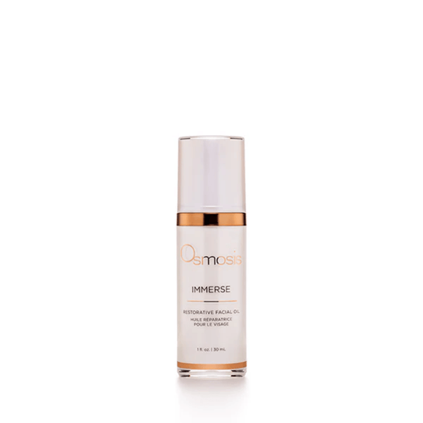 A white and gold bottle of Immerse | Osmosis restorative facial oil for skincare and wellness displayed on a clean white background.