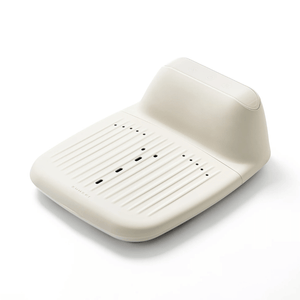 Modern beige wellness device with a smooth, contoured design featuring vent holes and control buttons, designed for skincare and body care use, SUMSEI Air Shower | SUMSEI.