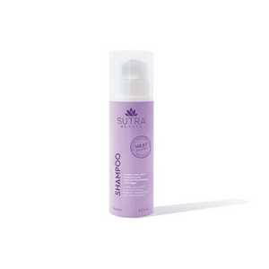 Bottle of Heat Guard Shampoo | SUTRA in light purple packaging with white pump dispenser, promoting hair protection up to 450°F and vegan ingredients for hair care and wellness.