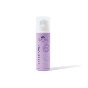 A lavender-colored bottle of Heat Guard Conditioner | SUTRA with a white pump cap, designed to protect hair from heat damage while supporting wellness and care.