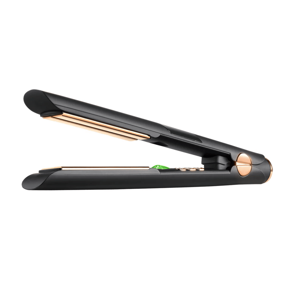 Hand holding the IR2 Infrared Flat Iron - 1" | SUTRA against a light purple background, showcasing its sleek black design and infrared heating plate.