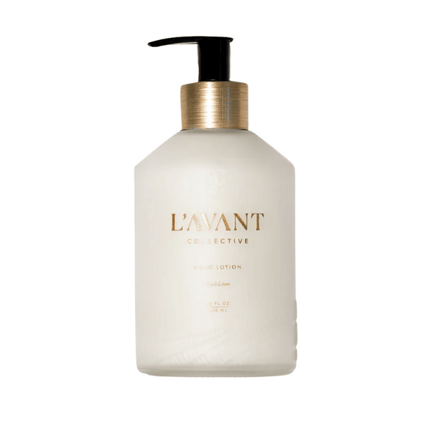 Bottle of Hand Lotion - Fresh Linen | L'AVANT Collective with a gold pump dispenser, designed for skincare and body care with a fresh linen scent.