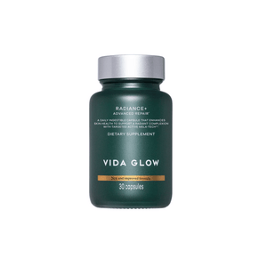 Bottle of Radiance+ Capsules | VIDA GLOW dietary supplement featuring advanced repair formula for skin health enhancement with 30 capsules in a dark green container.