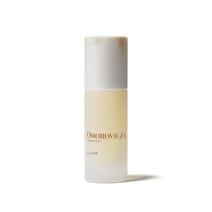 Minimalist bottle of Elixir | Omorovicza with a frosted finish and white cap, designed for skincare and wellness routines.