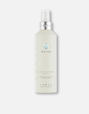 Bottle of Body Oil | Zents Water Luminous Cashmere formula with organic coconut and passionflower for skincare and body care wellness.