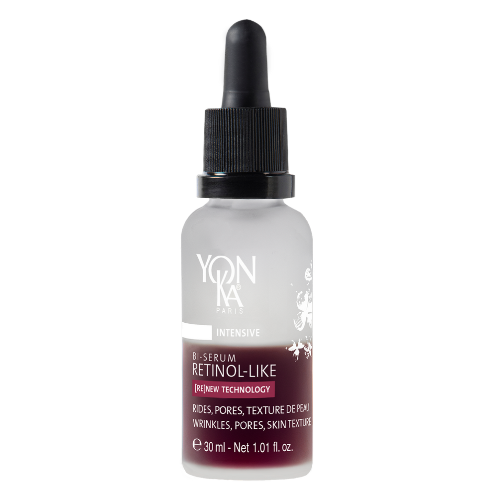 Bottle of Retinol-Like Bi-Serum | Yon-Ka Paris with dropper cap, featuring clear frosted glass and label highlighting skincare benefits for wrinkles, pores, and skin texture.