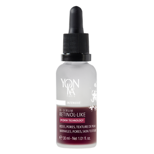 Bottle of Retinol-Like Bi-Serum | Yon-Ka Paris with dropper cap, featuring clear frosted glass and label highlighting skincare benefits for wrinkles, pores, and skin texture.