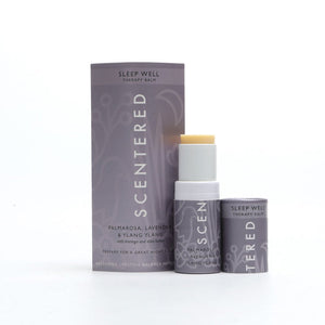 Tube and packaging of Sleep Well Therapy Balm | Scentered in calming purple tones, featuring palmarosa, lavender, and ylang ylang aromatherapy for restful wellness.