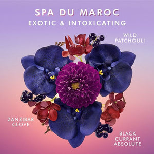 Floral arrangement featuring deep blue and purple flowers with accents of wild patchouli, Zanzibar clove, and black currant absolute highlighting the exotic scents of Hand Cream | Moroccanoil.
