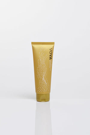 Tube of Cast Away Cleansing Facial Wash | VOYA in a gold container with elegant white text and branding, designed for skincare and facial cleansing.