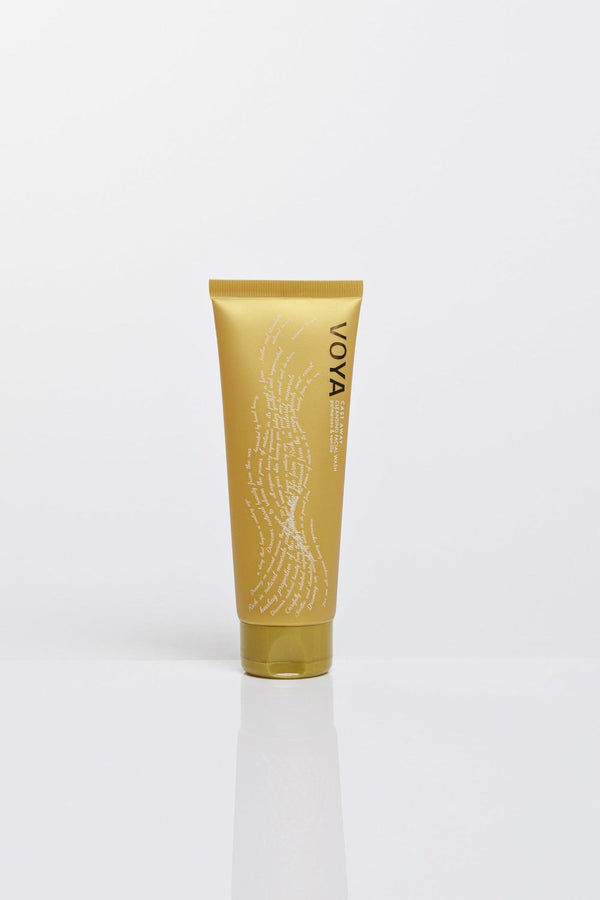 Tube of Cast Away Cleansing Facial Wash | VOYA in a gold container with elegant white text and branding, designed for skincare and facial cleansing.