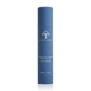 Blue cylindrical bottle of Revita-Cyte Complex | Circadia revitalizing lotion for skincare, designed to improve skin health and vitality.