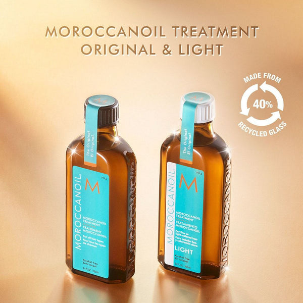 Two amber glass bottles of Moroccanoil Treatment | Moroccanoil, Original and Light versions, with turquoise labels and text highlighting recycled glass content.