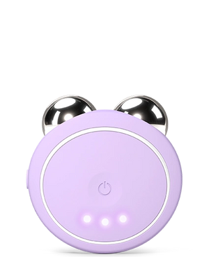 BEAR™ 2 Go | FOREO in lavender with metallic massage spheres, a compact skincare device designed for facial toning and recovery, featuring an LED power button and three indicator lights.