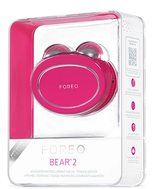 BEAR™ 2 | FOREO advanced microcurrent facial toning device in vibrant pink designed for skincare and wellness recovery with innovative Intensity Shock System.