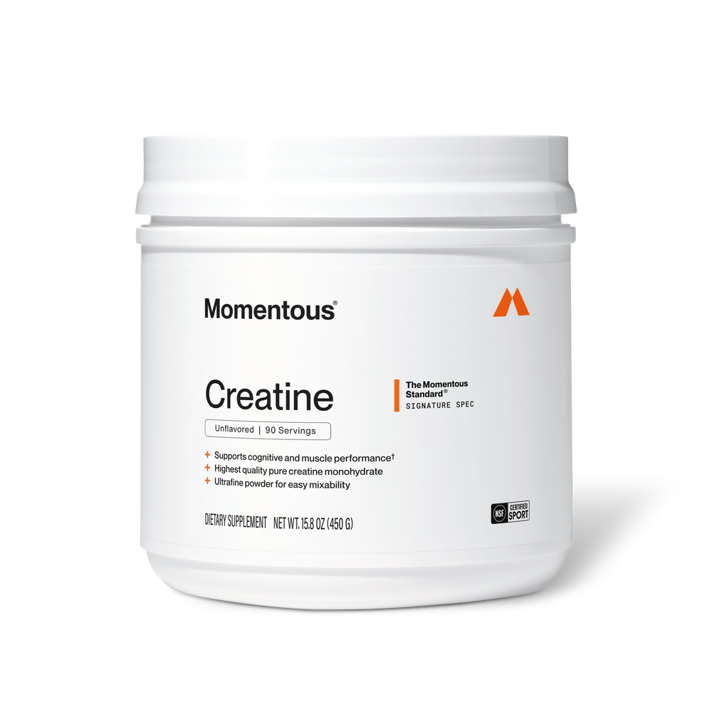 White container of Creatine - 90 Servings dietary supplement by Momentous, designed to support cognitive and muscle performance with high purity creatine monohydrate powder.