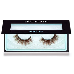 Close-up of a pair of natural brown false eyelashes in a black case with a transparent lid, labeled Happy Lash | Moxielash, designed for enhancing eye appearance.
