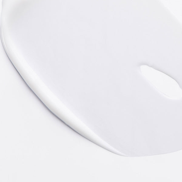 Close-up of smooth, white cream texture representing Hydra Original Cream | Phytomer, highlighting its rich, hydrating skincare formulation.