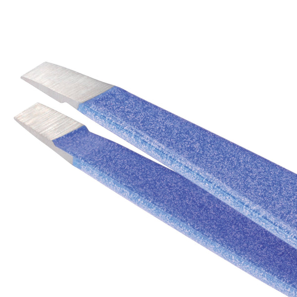 Close-up of blue textured metal Granite Sky Mini Slant Tweezer | Tweezerman tips designed for precise grooming and skincare detail.