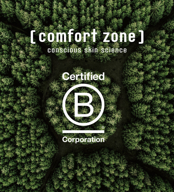 Aerial view of a dense forest with the text "[ comfort zone ] conscious skin science Certified B Corporation" overlayed, highlighting eco-friendly skincare principles related to Hydramemory Hydra & Glow Ampoules | [ comfort zone ].