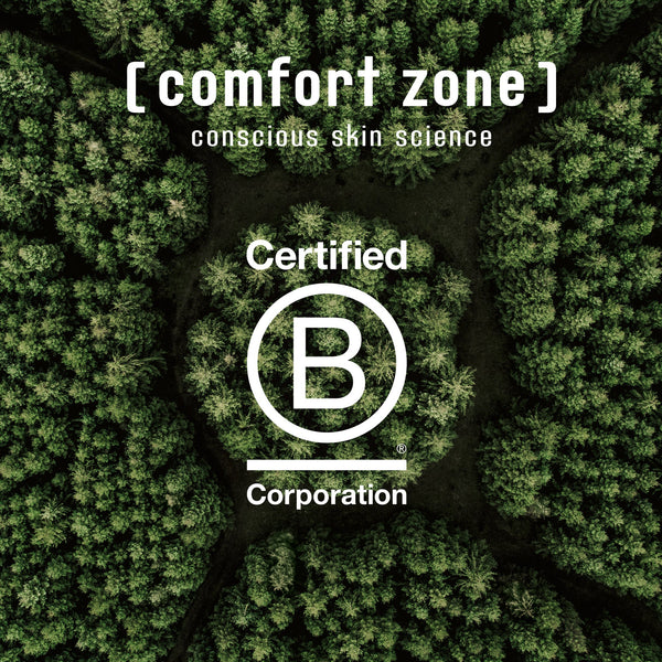 Aerial view of a lush green forest with the text "[ comfort zone ] conscious skin science Certified B Corporation" emphasizing sustainability and ethical skincare associated with Essential Peeling | [ comfort zone ].