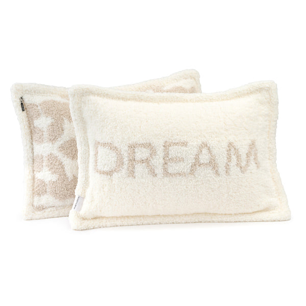 Two soft cream-colored pillows with plush chenilla texture, one featuring the word DREAM and the other a subtle decorative pattern, from Pillows - Dream - Chenilla Cloud™ | Kashwére.