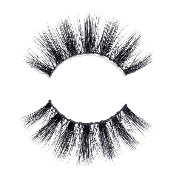 Close-up of dramatic, voluminous false eyelashes in black, designed for enhancing eye appearance with the Money Lash | Moxielash style.