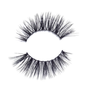 Pair of voluminous, fluttery false eyelashes designed for dramatic eye enhancement, featuring wispy, layered black lashes, Sexy Lash | Moxielash.