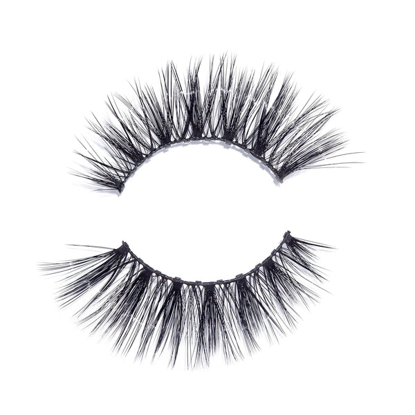 Pair of voluminous, fluttery false eyelashes designed for dramatic eye enhancement, featuring wispy, layered black lashes, Sexy Lash | Moxielash.