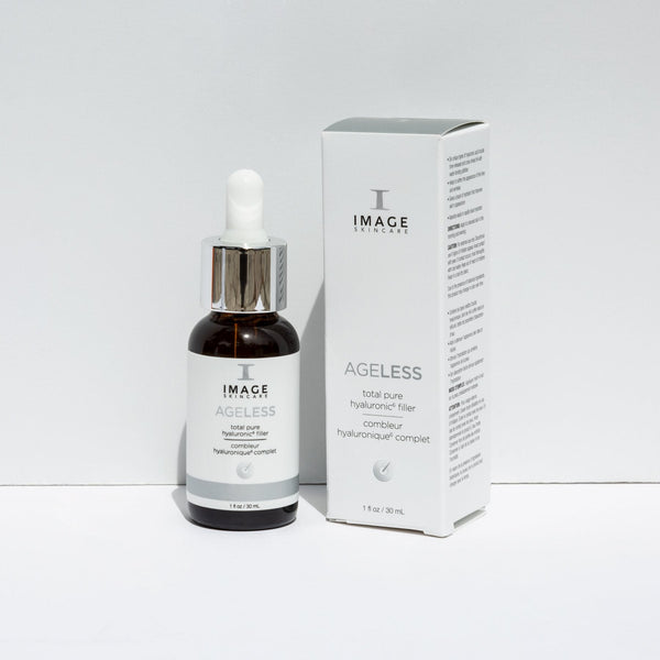 Bottle and box packaging of AGELESS total pure hyaluronic 6 filler | IMAGE Skincare displayed on a white surface for skincare and wellness.