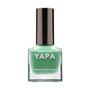 Annie Nail Lacquer | YAPA professional green nail polish bottle with black cap, designed for vibrant and long-lasting manicure looks.