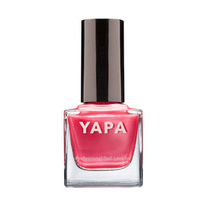 Christine Nail Lacquer | YAPA in a vibrant coral pink shade with a sleek black cap, designed for professional-quality manicure applications.