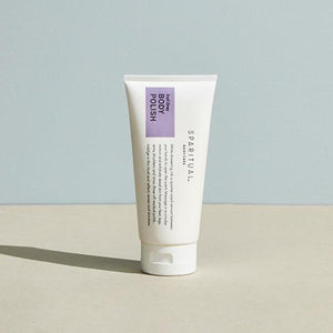 Tube of Earl Grey BODY POLISH | Sparitual standing on a neutral surface, featuring minimalist packaging designed for skincare and body care wellness routines.