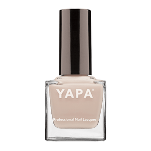 Emily Nail Lacquer | YAPA in a neutral beige shade with a sleek black cap, presented in a clear glass bottle for a professional nail lacquer look.
