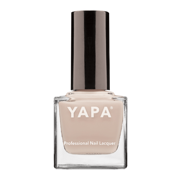 Emily Nail Lacquer | YAPA in a neutral beige shade with a sleek black cap, presented in a clear glass bottle for a professional nail lacquer look.