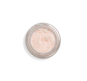 Top view of a light pink creamy mousse in a clear jar, showcasing the texture of Evening Rose Moon Dip® Ageless Facial Sleep Mousse with Peptides + Retinol | Farmhouse Fresh skincare product.